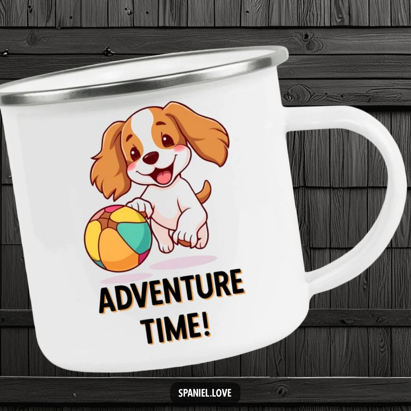 Funny enamel camping mug showing a spaniel dog with ears flapping, joyfully chasing a colorful bouncing ball, ideal for outdoor adventures.