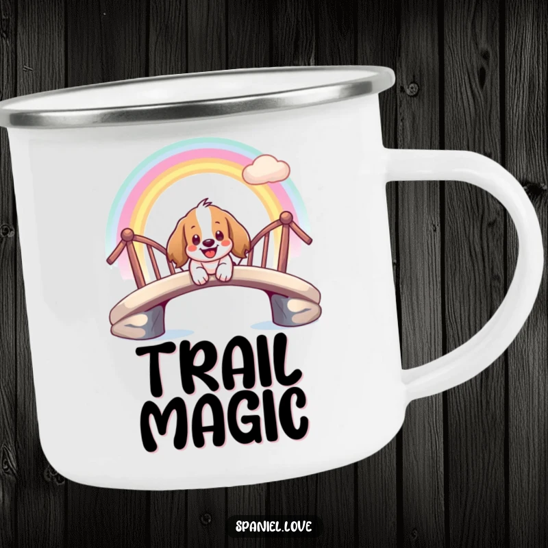 Funny camping mug featuring a giddy spaniel character smiling as it slides down a vibrant rainbow bridge.
