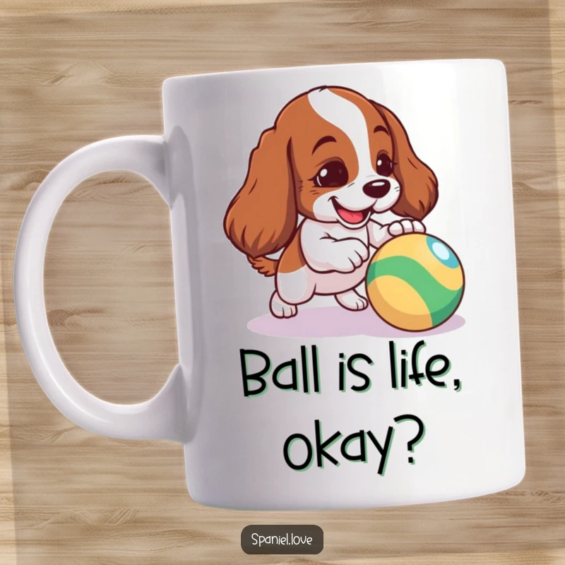 Funny Spaniel Dog Mug: A mischievous spaniel playfully nudging a colorful bouncing ball, adding a dash of canine fun.