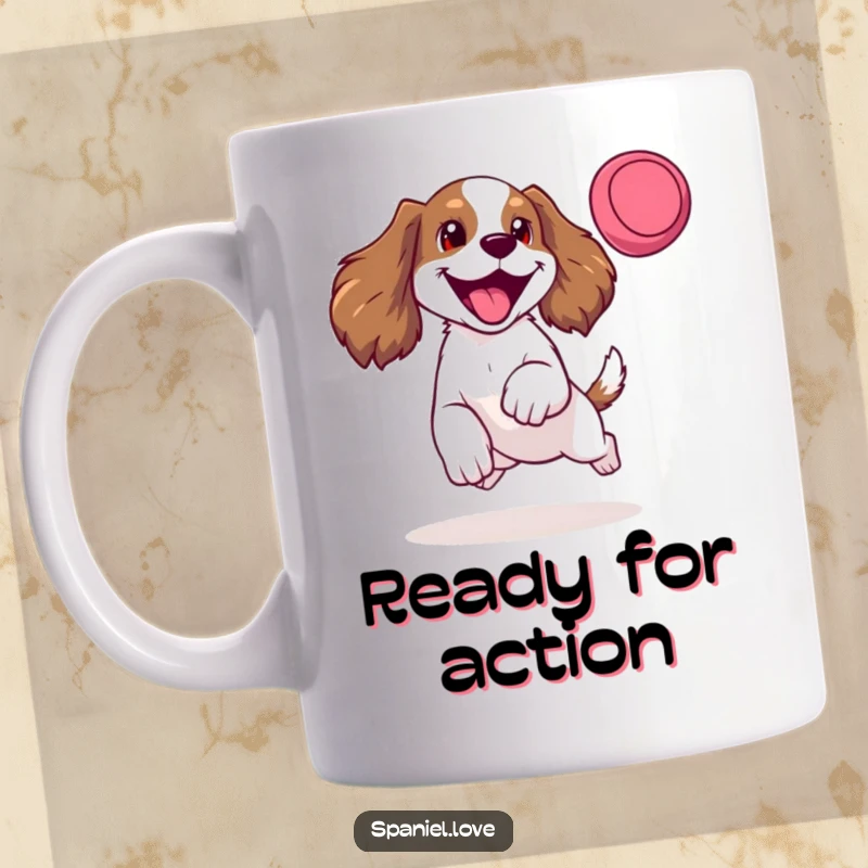 Funny mug showing a happy spaniel mid-air, leaping enthusiastically for a frisbee with its tongue out and a joyful bark.