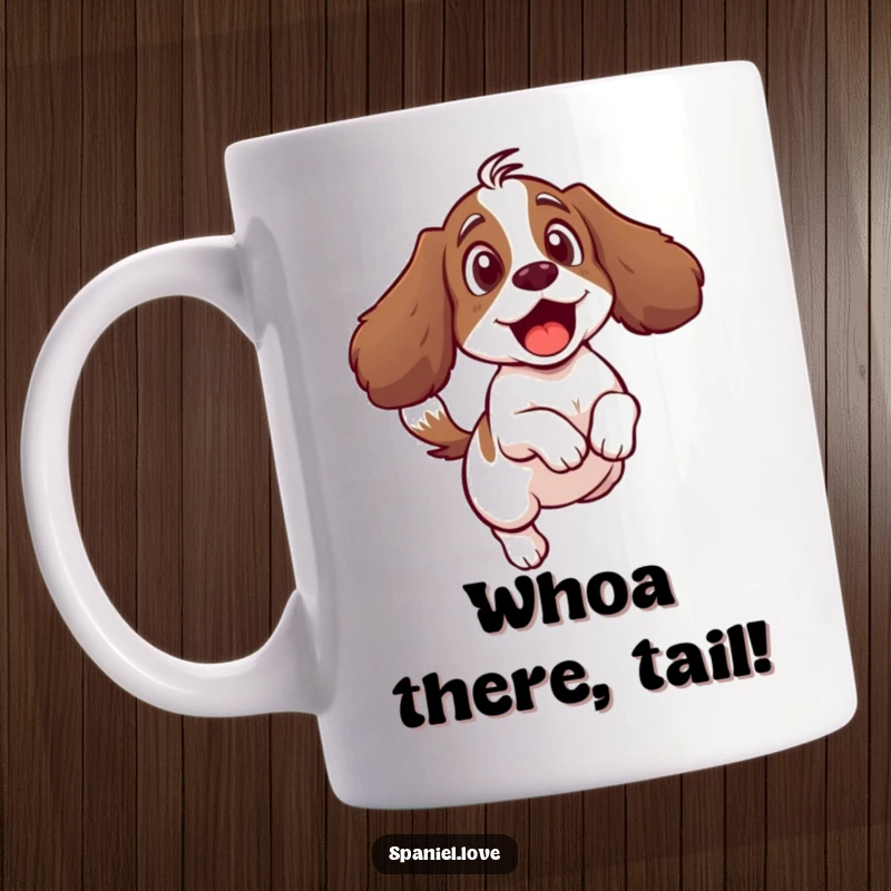 Funny mug depicting a surprised spaniel character recoiling from its own vigorously wagging tail in comical shock.