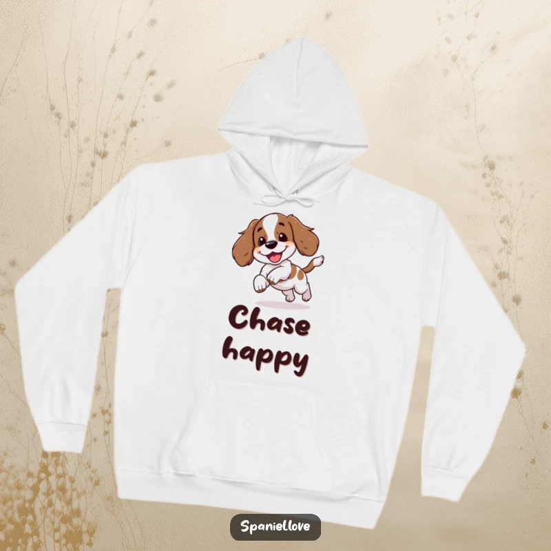Soft hoodie featuring a funny spaniel character caught in the act of chasing its tail with a joyful yip.