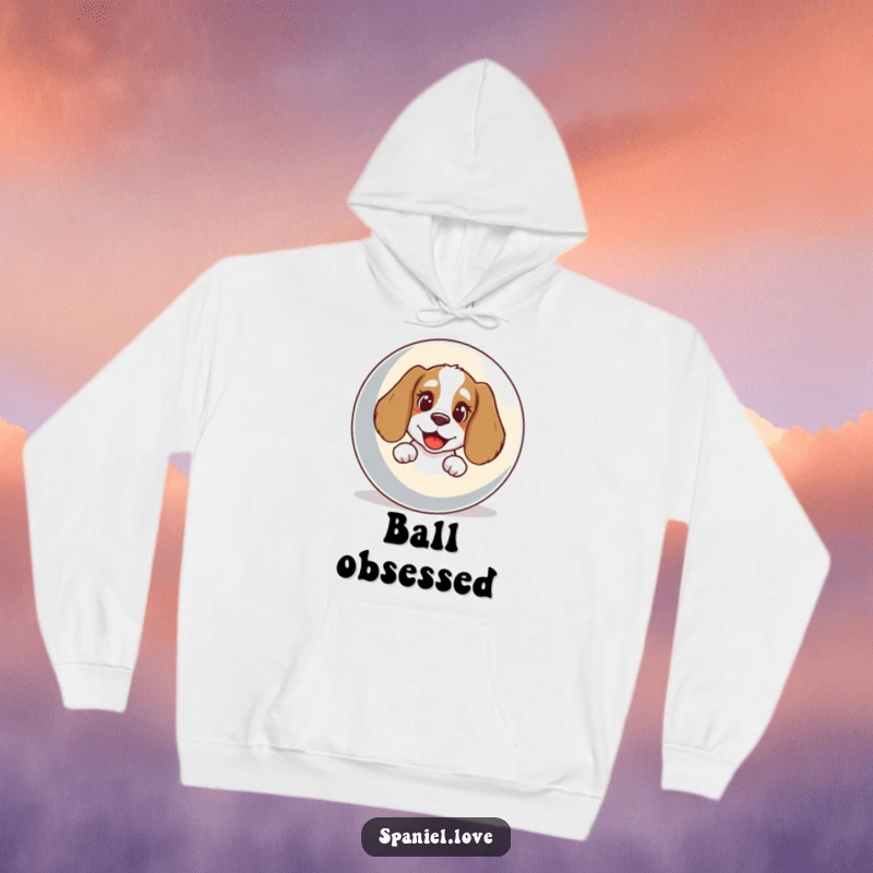Funny Spaniel Hoodie: A happy spaniel with an open bark peeks from behind a giant, round ball.
