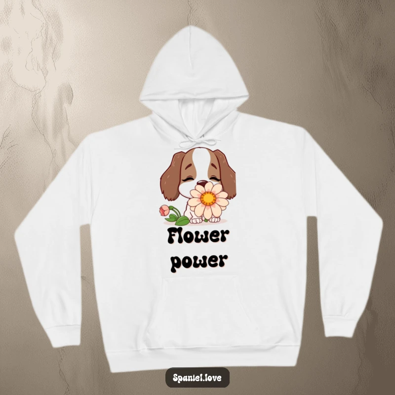 Funny hoodie illustrating a happy spaniel character blissfully burying its nose in an oversized, beautiful flower.