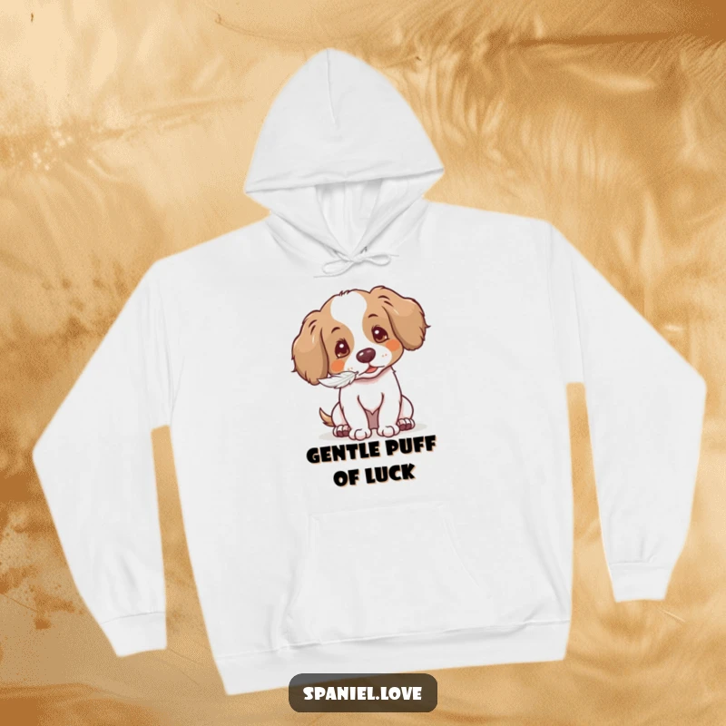 Funny Gentle Spaniel Hoodie: spaniel blowing a seed with a soft puff, perfect for cozy warmth and gifts.