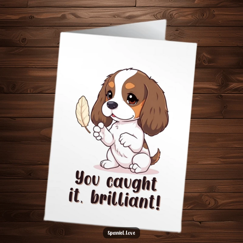 Funny Free Printable Congratulations Card: Spaniel's tiny paws batting at a delicate floating feather. Focused dog.