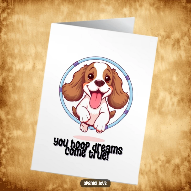 Funny Free Printable Congratulations Card: Spaniel impressively jumps through a whimsical hula hoop, tongue lolling out.
