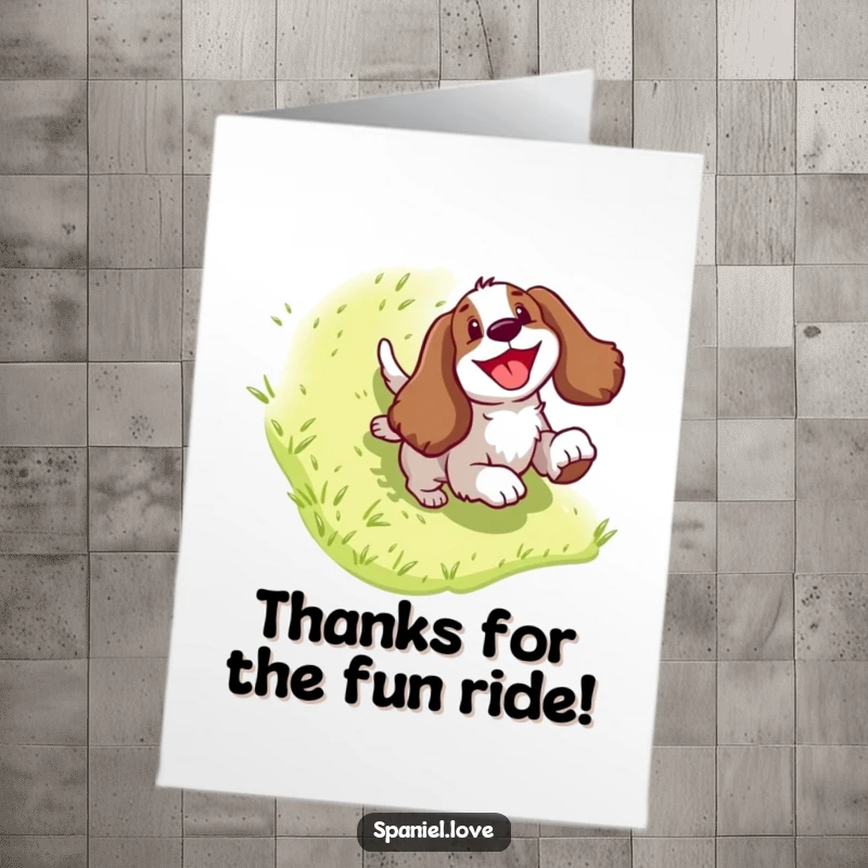 Funny Free Printable Thank You Card: Adorable Spaniel joyfully sliding downhill, conveying immense gratitude with humor.