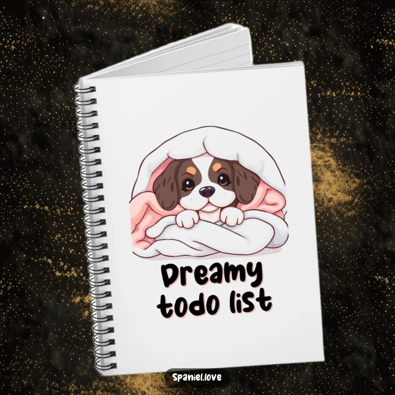 Funny notebook cover featuring a spaniel puppy peeking from soft blankets, perfect for jotting down sweet ideas.