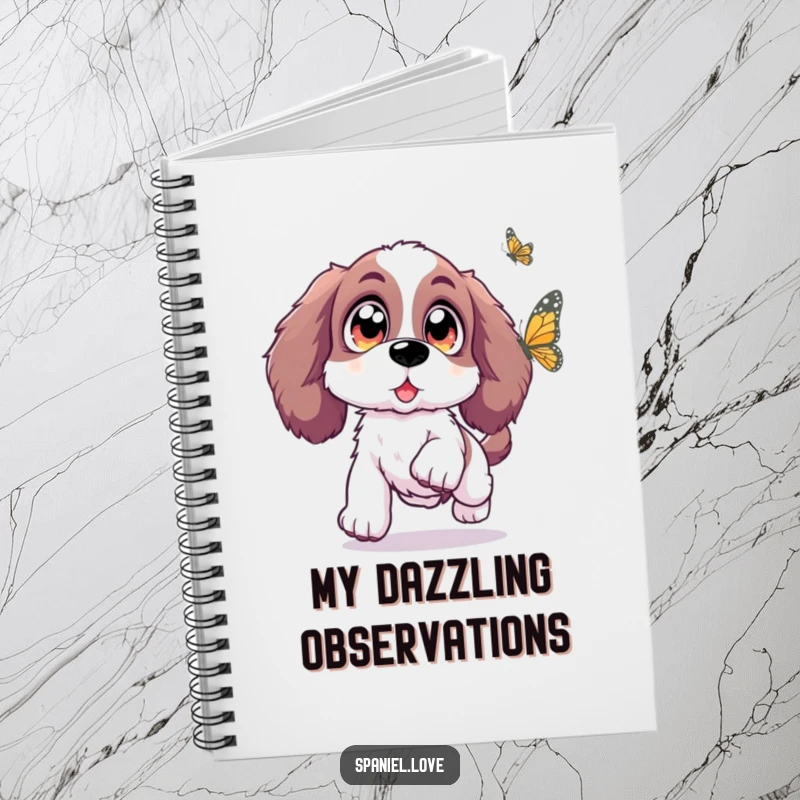 Funny Spaniel notebook with a Spaniel with oversized, sparkling eyes joyfully leaping towards a butterfly, inspiring magical thoughts.