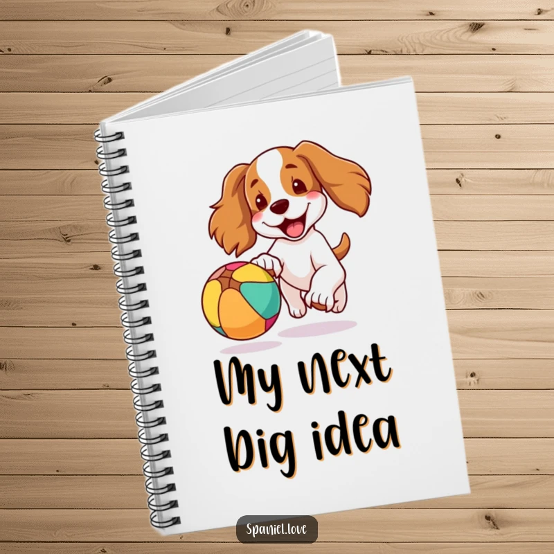 Funny notebook cover with a spaniel dog, ears flapping, joyfully chasing a colorful bouncing ball, great for jotting down happy thoughts.
