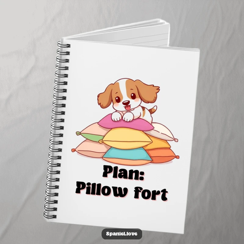 Funny Spaniel Notebook illustrating a spaniel pouncing on pillows, perfect for note-taking with a humorous touch.