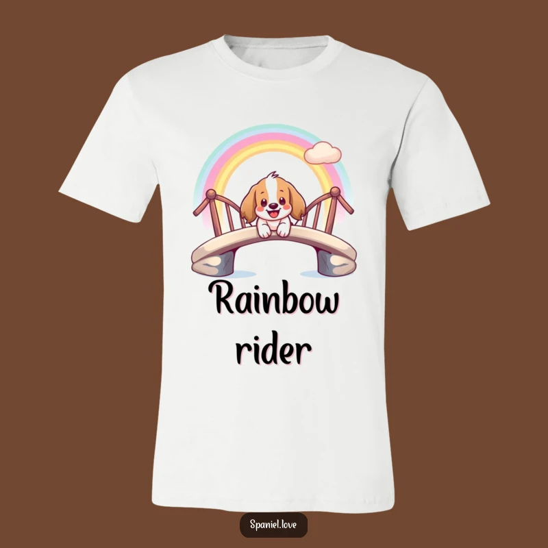 Funny Spaniel Rainbow Ride Tee: Wearable Whimsy with a Smiling Dog Character.