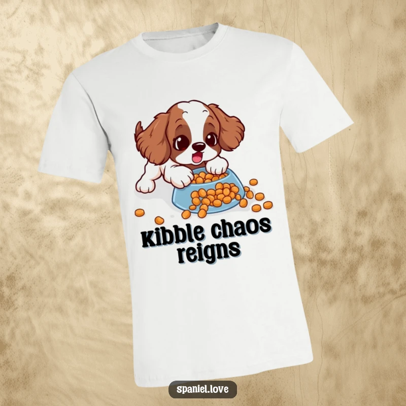 Funny spaniel t-shirt depicting a dog comically sliding with surprise on a pile of spilled kibble, perfect for laugh-out-loud moments.