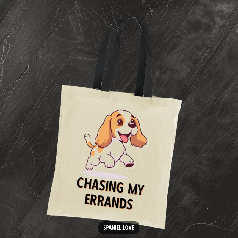 Funny tote bag with a spaniel character with floppy ears, hilariously chasing its own wagging tail.