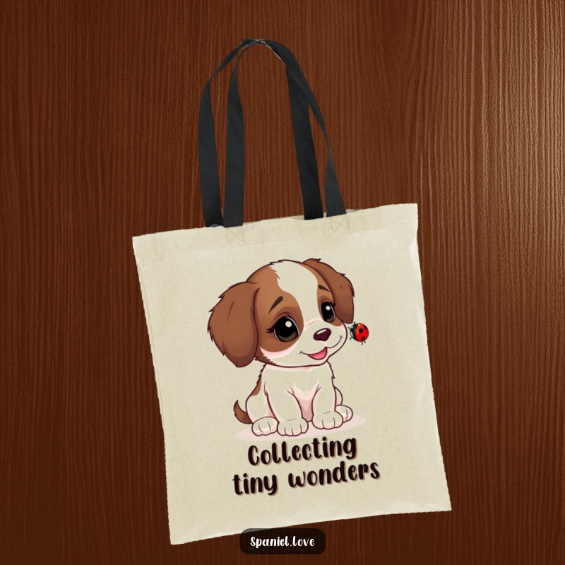 Funny Spaniel tote bag, head tilted in curiosity, observing a ladybug, a charming and humorous accessory for dog fans.