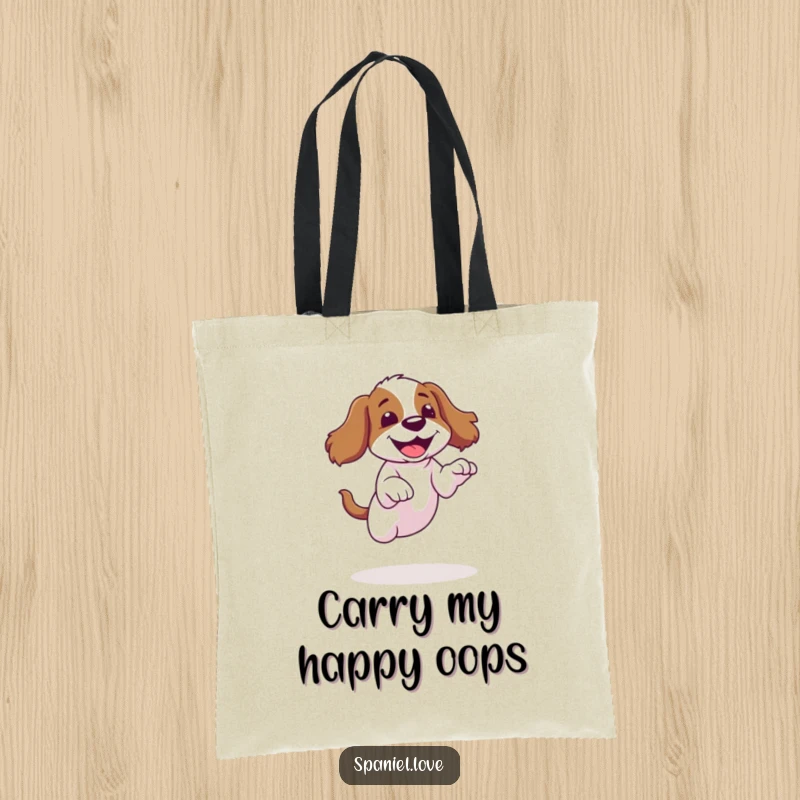 Funny spaniel tote bag depicting a dog's clumsy jump landing with a giggle, a practical humorous accessory.