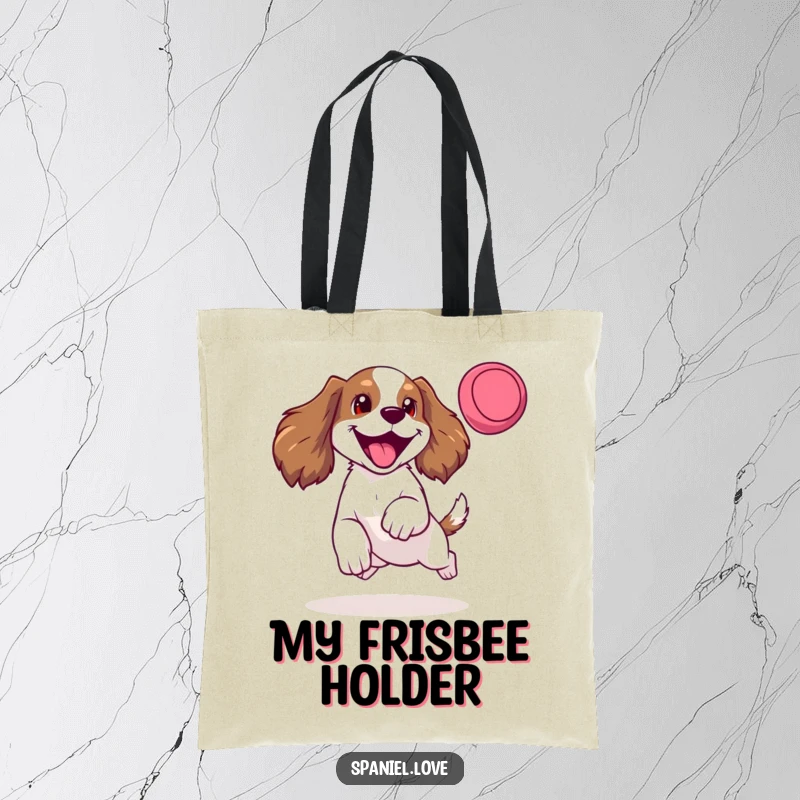 Funny tote bag with a happy spaniel mid-leap for a frisbee, tongue lolling, perfect for carrying items with canine energy.